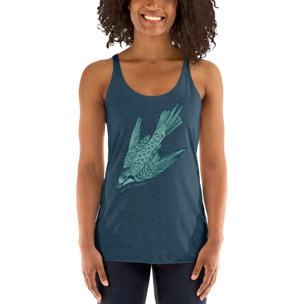 Woman wearing indigo racerback tank top with vintage diving bird design and Aerial Earth text